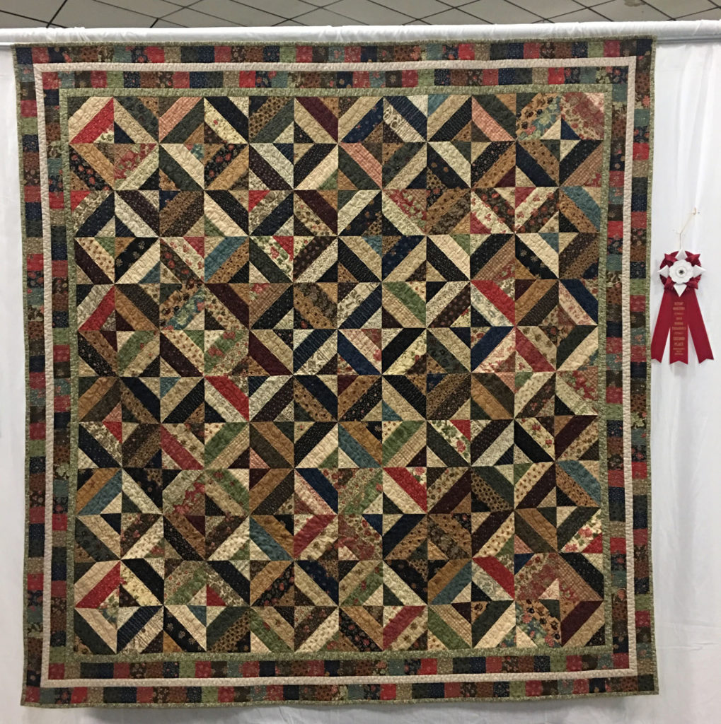 312 “Strip Magic” by Debi Snyder, 2nd Place Med/Large Individual Quilt, 2018 Kitsap Quilt Show