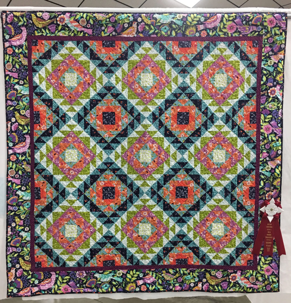 606 “The Jewel Box” by Margaret Jones, quilted by Libie Peterson, 2nd Place Medium Group Quilt, 2018 Kitsap Quilt Show