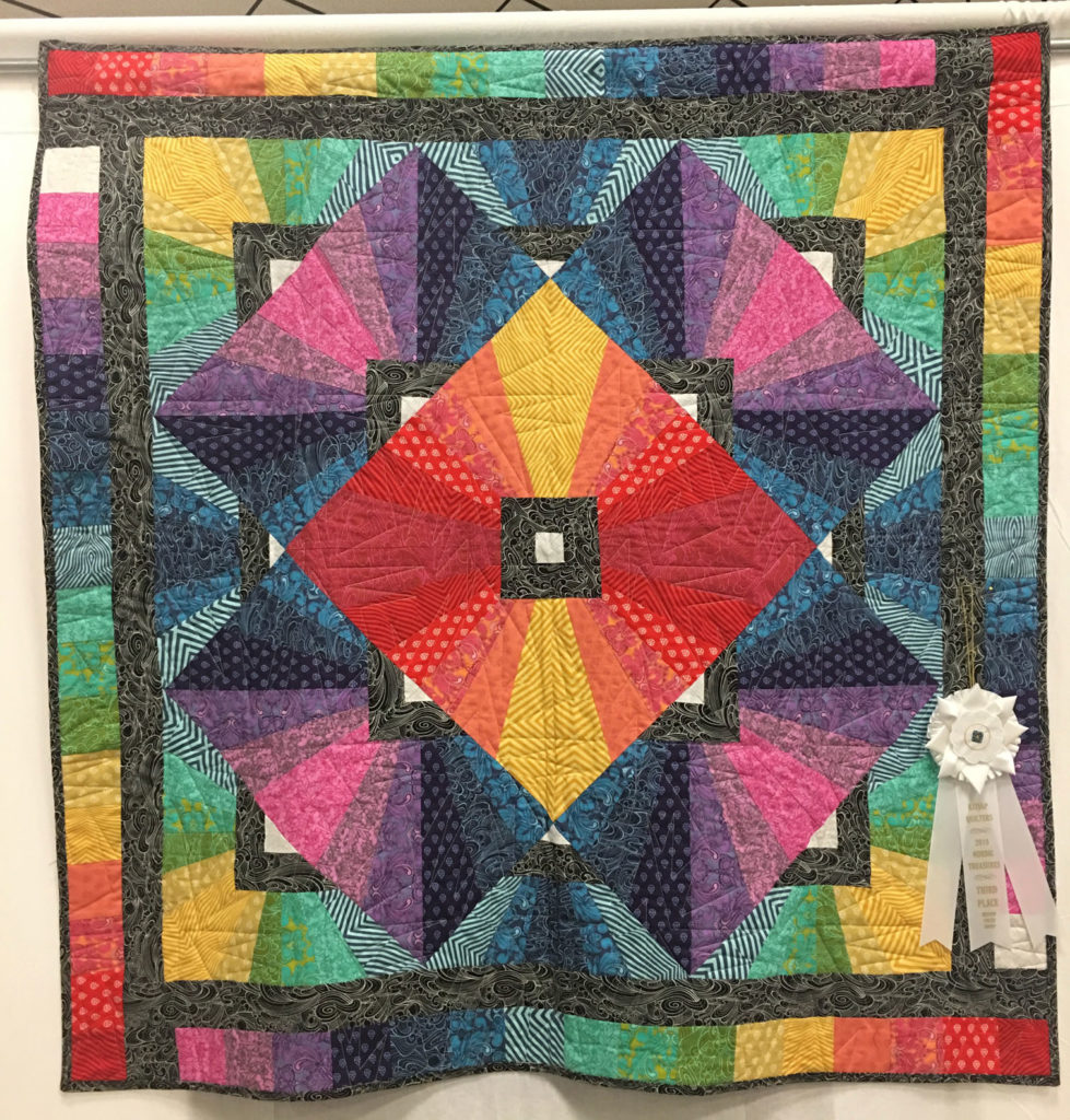 608 “Cheri’s Prism” by Cheri Searles, quilted by Marj Deupree, 3rd Place Medium Group Quilt, 2018 Kitsap Quilt Show