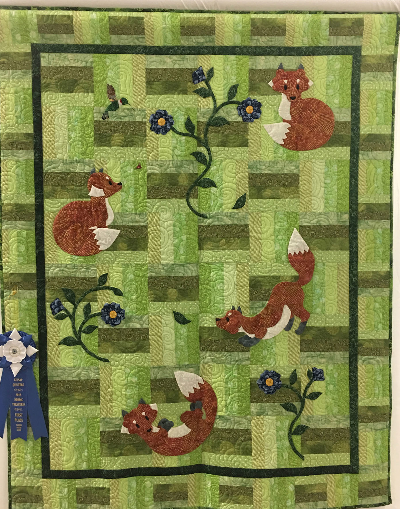 614 “Quilt for Kaci” made by Sharon Broom, quilted by Rainy Day Quilts, 1st place Medium Group Quilt, 2018 Kitsap Quilt Show